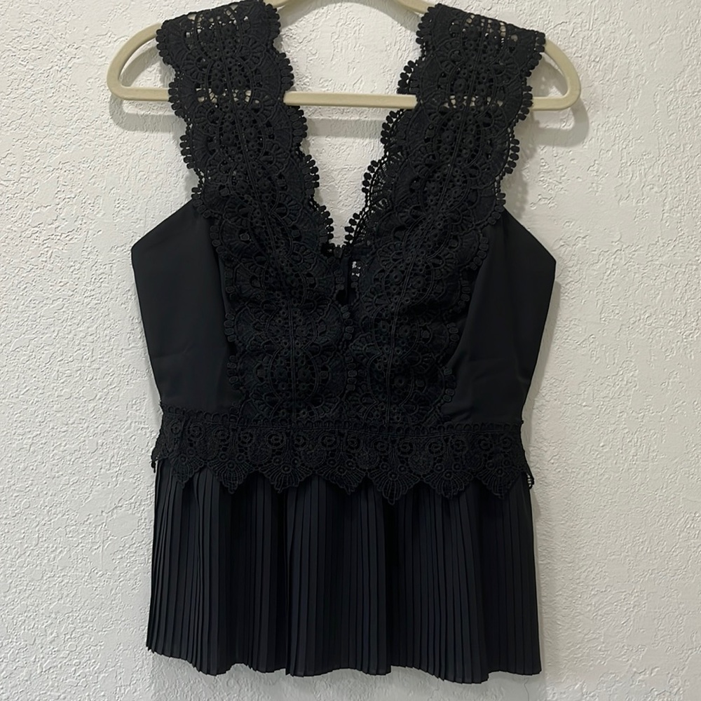 New with tag. Brand: Lulumari, Elegant top. Color: Black